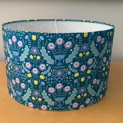 Flower fabric in blue. Handmade lampshade made in Suffolk